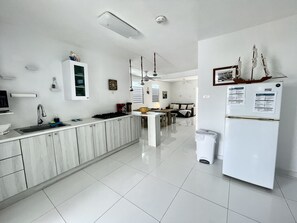 Fridge, microwave, stovetop, coffee/tea maker