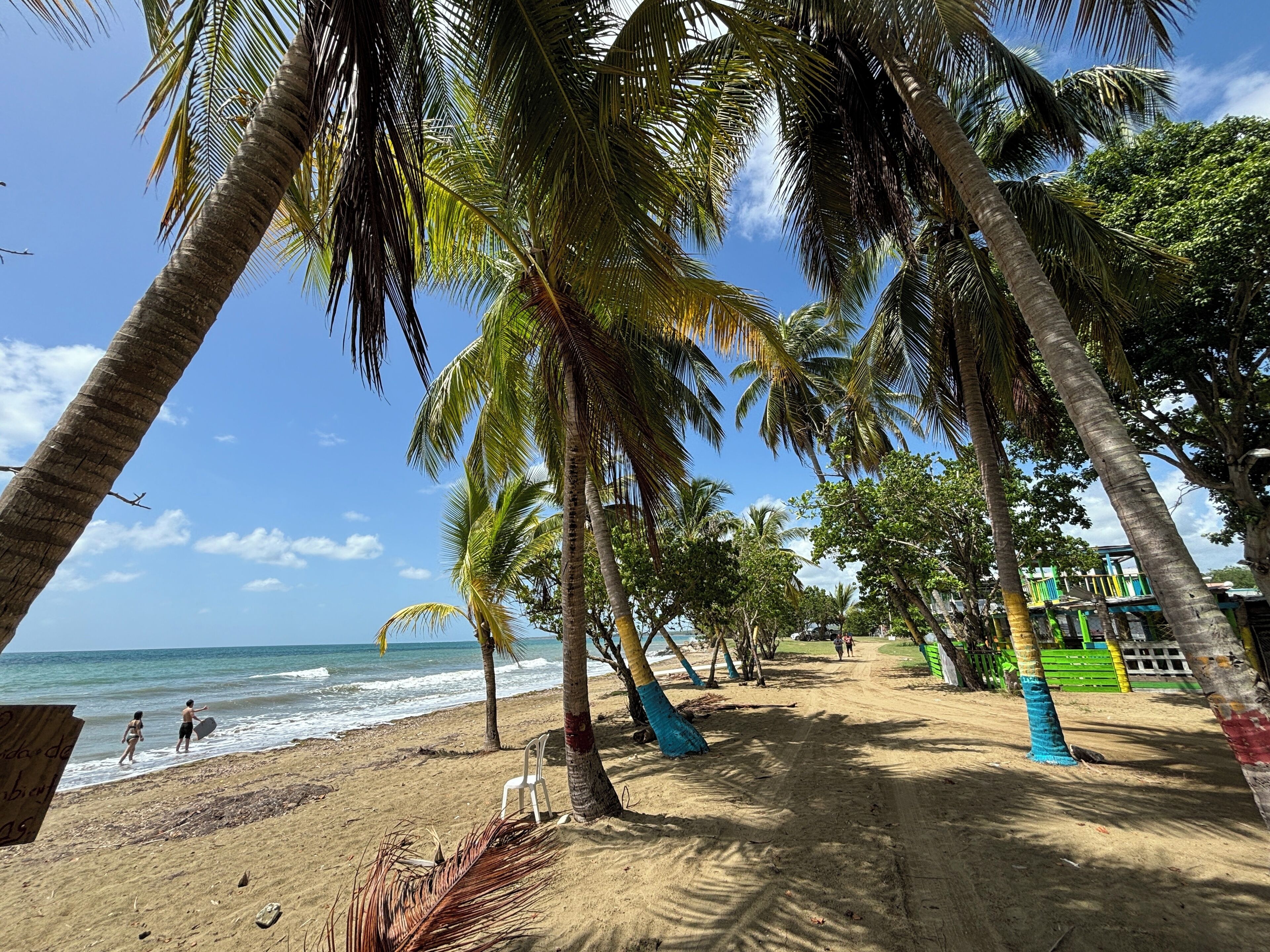On the beach, sun loungers, beach towels