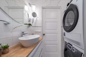Hair dryer, bidet, towels, soap