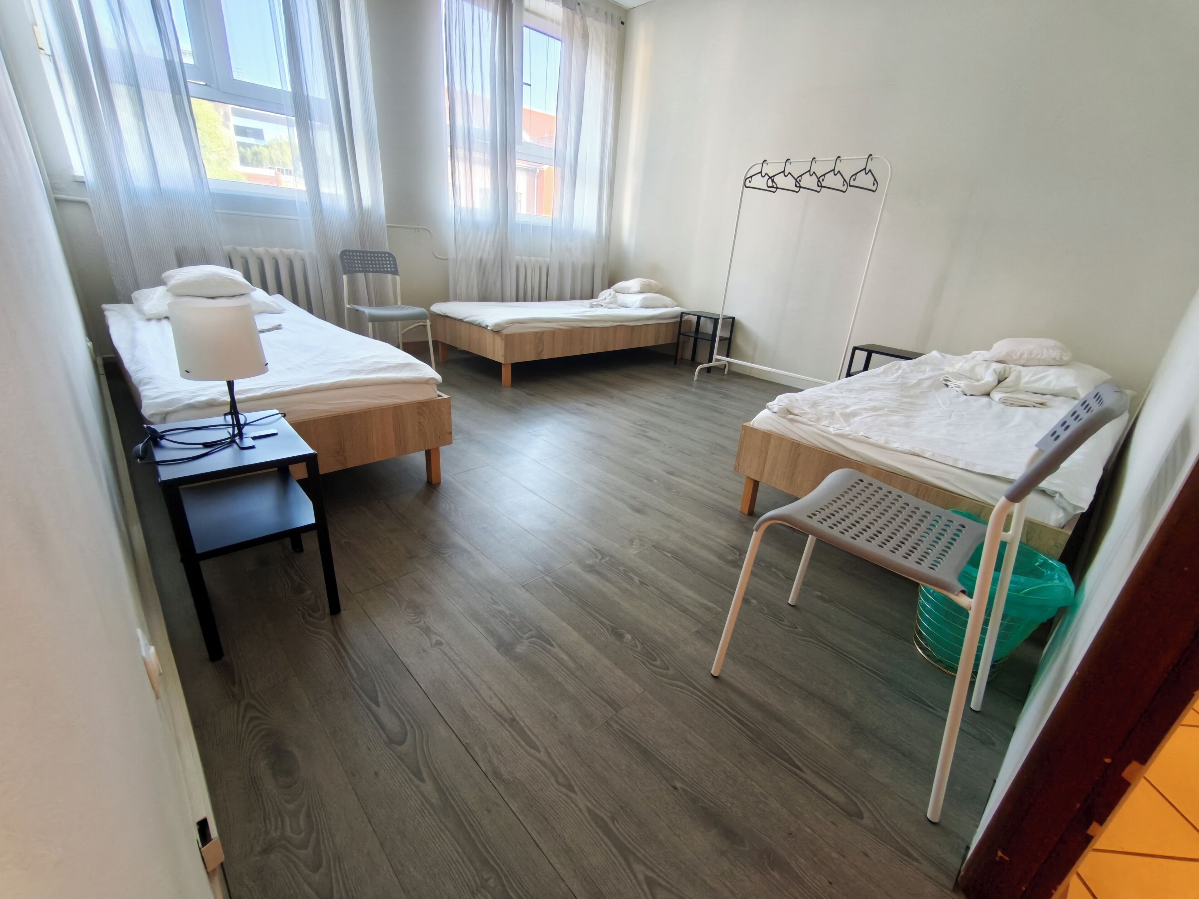Economy Triple Room, Non Smoking, City View | Hypo-allergenic bedding, blackout curtains