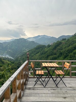 Exclusieve driepersoonskamer | Terras