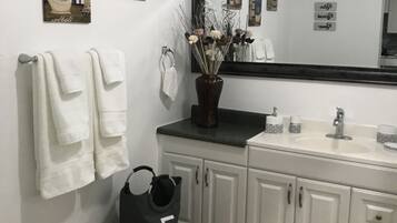 Hair dryer, towels, soap, shampoo