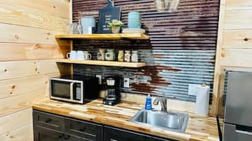 Fridge, microwave, coffee/tea maker, toaster