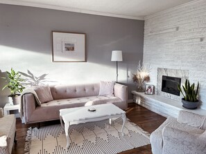 Smart TV, fireplace, foosball, books