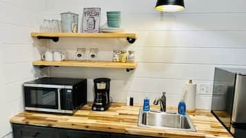 Fridge, microwave, coffee/tea maker, toaster