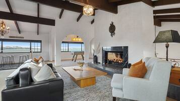 House | Living area | 55-inch TV with cable channels, fireplace