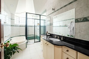 Shower, jetted tub, hair dryer, towels