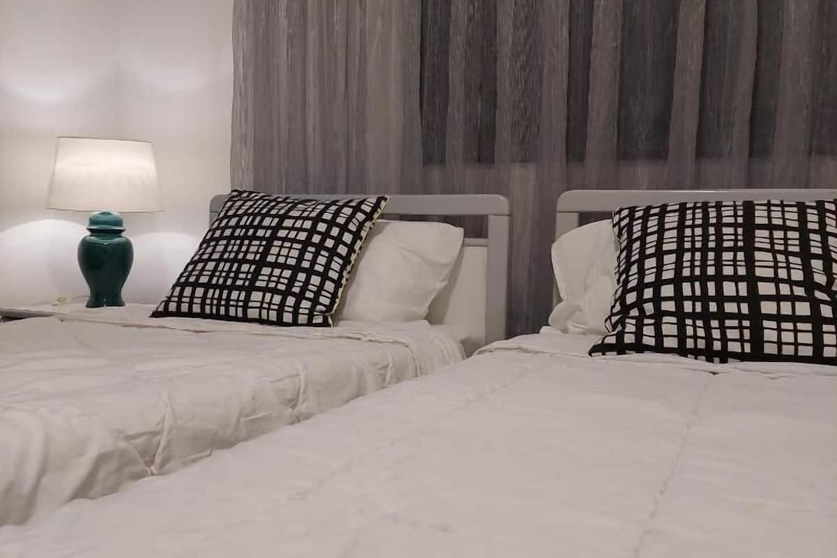 Habitación estándar con 2 camas individuales | Cortinas opacas y sistema de insonorización