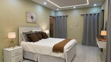 2 dormitorios, escritorio, tabla de planchar con plancha y wifi gratis