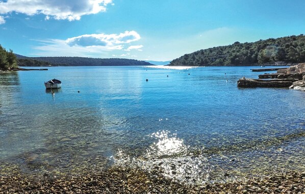 Perto da praia, prática de pesca 
