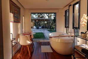 Cabin | Bathroom | Separate tub and shower, jetted tub, hair dryer, bathrobes - Reserva Cabanas (Balsa Nova)