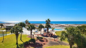 A resort with a pool, palm trees, and a beach view. - Gulf Front 2/2 Flash sale 3rd floor unit PPE6310 (Gulf Shores)