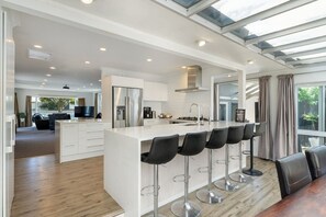 Open plan kitchen/ living and dining area