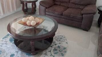 Family Villa | Living area | 32-inch Smart TV with digital channels, TV, streaming services