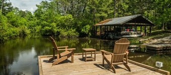 Secluded cozy tiny cabin on the water with fire pit and private dock