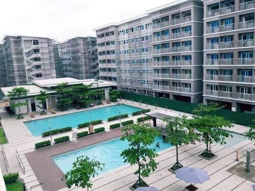 Stylish 1BR Retreat at Trees Residences — Fast WiFi, Smart TV, Near SM Fairview