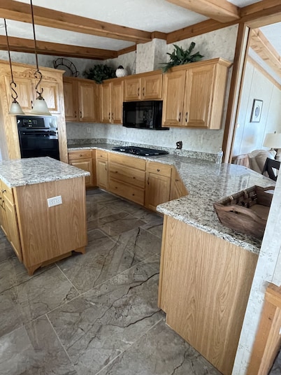 Waterfront Bungalow nightly panoramic view of our illuminated covered Bridge