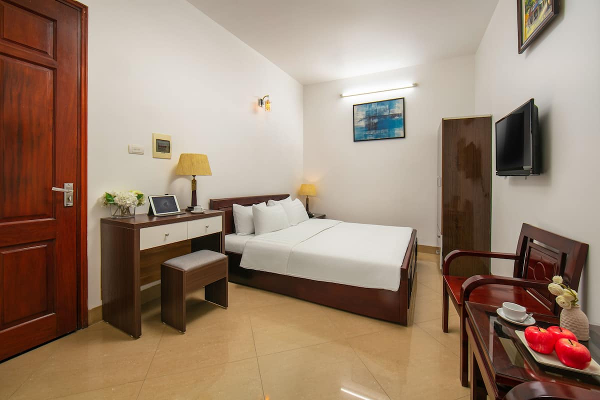 Superior Double Room | Living area | Flat-screen TV