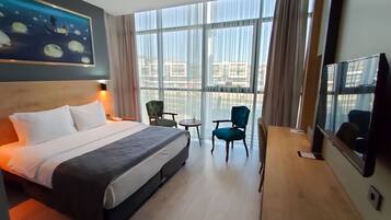 Ropa de cama de alta calidad y minibar