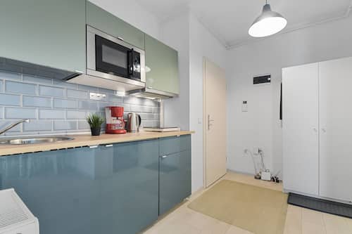 Comfort Apartment | Private kitchen | Fridge, microwave, oven, coffee/tea maker