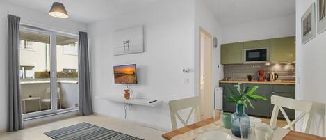 コンフォート アパートメント | 客室内のダイニングエリア