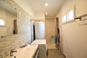 Ducha, secador de pelo