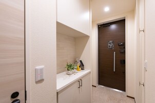 Basic Apartment | Desk, laptop workspace, blackout drapes, iron/ironing board