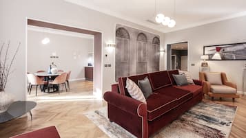 Deluxe Apartment | Living area | 48-inch flat-screen TV with cable channels, TV