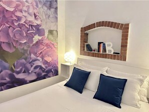 1 غرفة نوم ومكواة/لوح كي وواي فاي وملاءات أسرّة