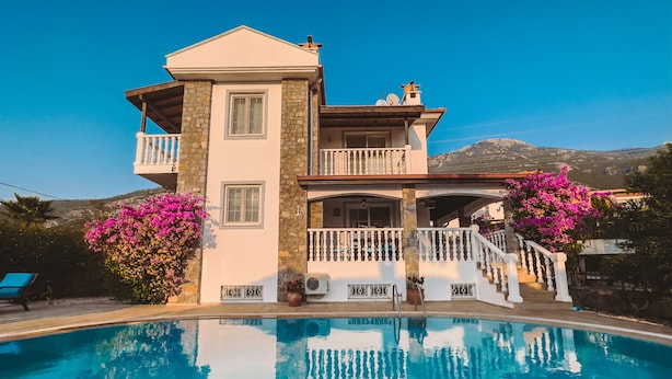A two-story house with a swimming pool in front. - Private Villa ErzanMyne Private Pool Mountain View Ovacik Oludeniz (Muğla)