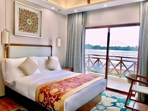 Signature Room, 2 Bedrooms, Balcony, Ground Floor | Individually decorated, desk, free WiFi, bed sheets - Melsweldon Laos Hotel (Khong District)