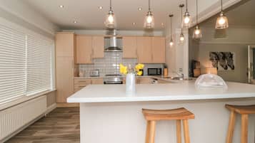 Fridge, dishwasher, electric kettle, cookware/dishes/utensils