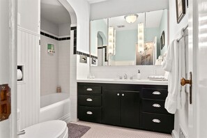 Combined shower/tub, hair dryer, towels - Two Stunning 1938 Homes | Blocks to Downtown (Boise)