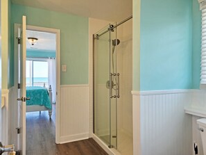 Shower, hair dryer, towels