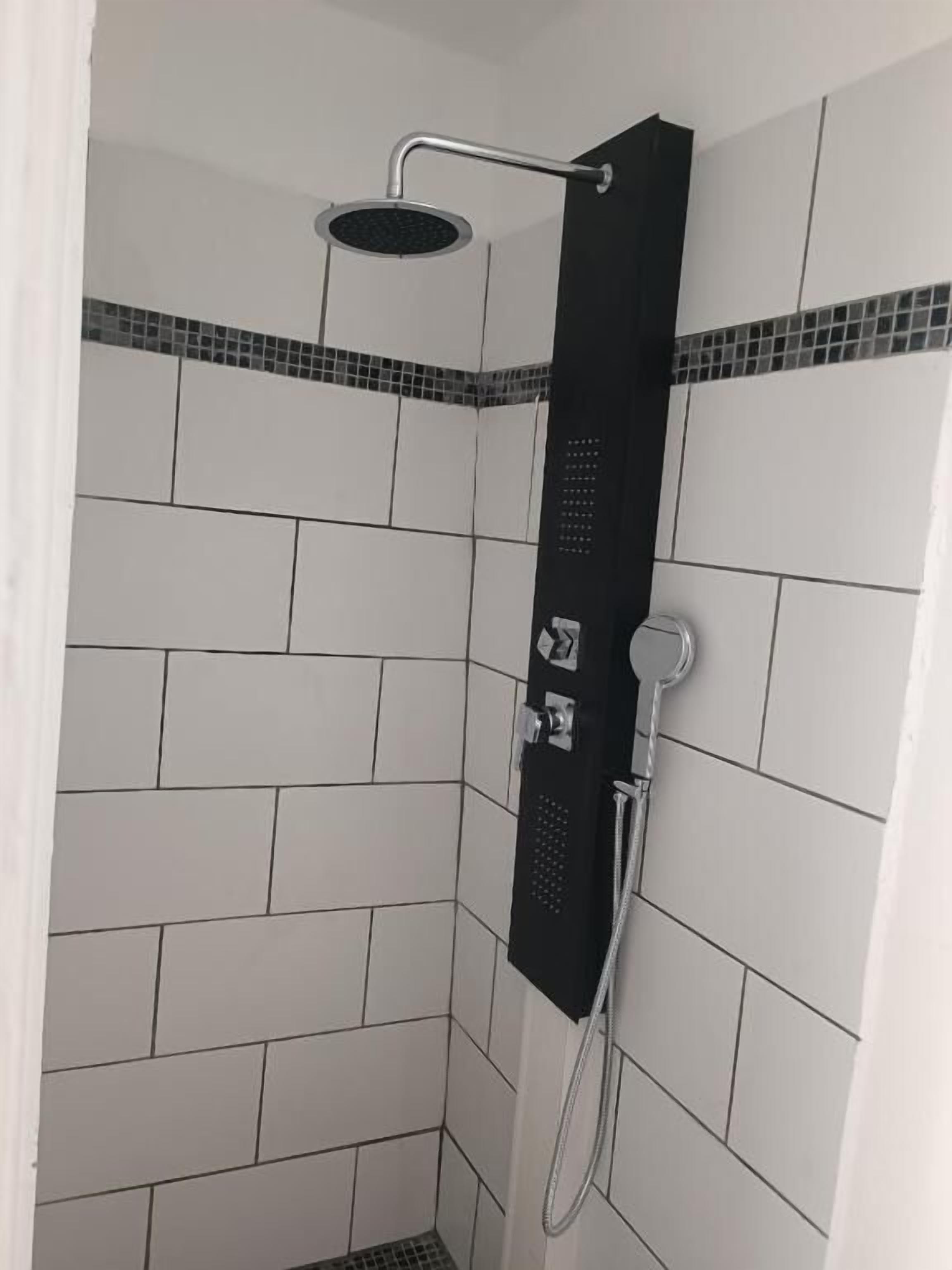 basic shared dormitory | bathroom | shower, free toiletries, towels, soap