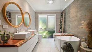 Bathtub, hair dryer, towels