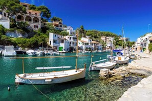 Surrounded by Mediterranean-style buildings, this marina offers a serene waterfront setting.
