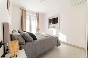 1 dormitori, planxa i posts de planxar, wifi gratuïta i roba de llit