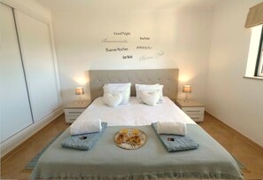 1 dormitorio, tabla de planchar con plancha, cuna de viaje y wifi