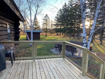 Log Home! Heated Garage! In town Warroad, MN. Close to Hockey Arenas & Fishing!