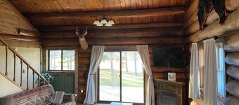 Log Home! Heated Garage! In town Warroad, MN. Close to Hockey Arenas & Fishing!