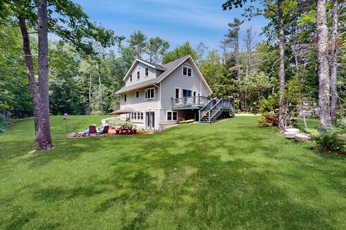 Sunny, lakefront home on South Pond with private dock, great deck & firepit
