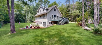 Sunny, lakefront home on South Pond with private dock, great deck & firepit