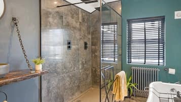 Bathtub, hair dryer, towels