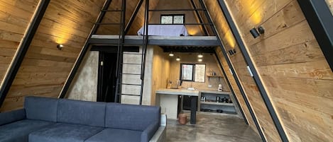 Cabaña de lujo, Alpina | Área de sala de estar | Tenis de mesa