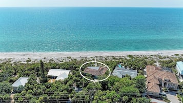 Situated on a beachfront, this traditional house offers access to the sandy shore.