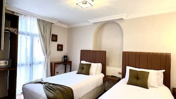 ห้องดีลักซ์ทวิน | โต๊ะทำงาน, Wi-Fi ฟรี, ผ้าปูที่นอน