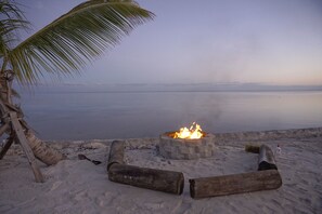 On the beach, sun-loungers, beach towels