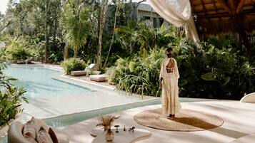 Outdoor pool, open 8:00 AM to 11:00 PM, pool umbrellas, sun loungers