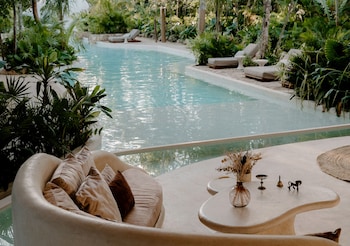 Outdoor pool, open 8:00 AM to 11:00 PM, pool umbrellas, sun loungers at Hotel Milam, Michelin Key winner